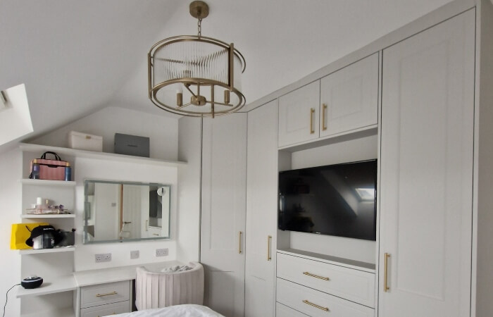 white modern wardrobes with brass hardware